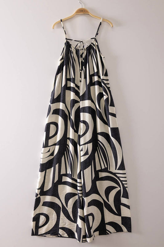 Sleeveless Oversized Woven Print Jumpsuit: BLACK