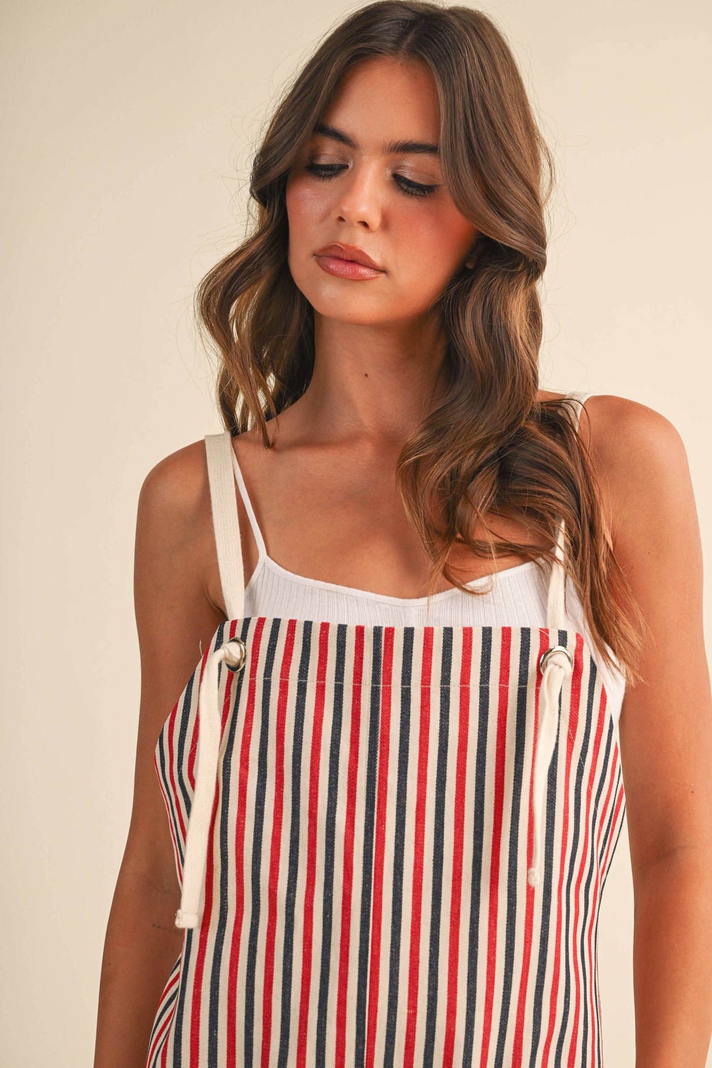 A MULTI STRIPED ROPE STRAP SHORTALLS: RED/BLUE