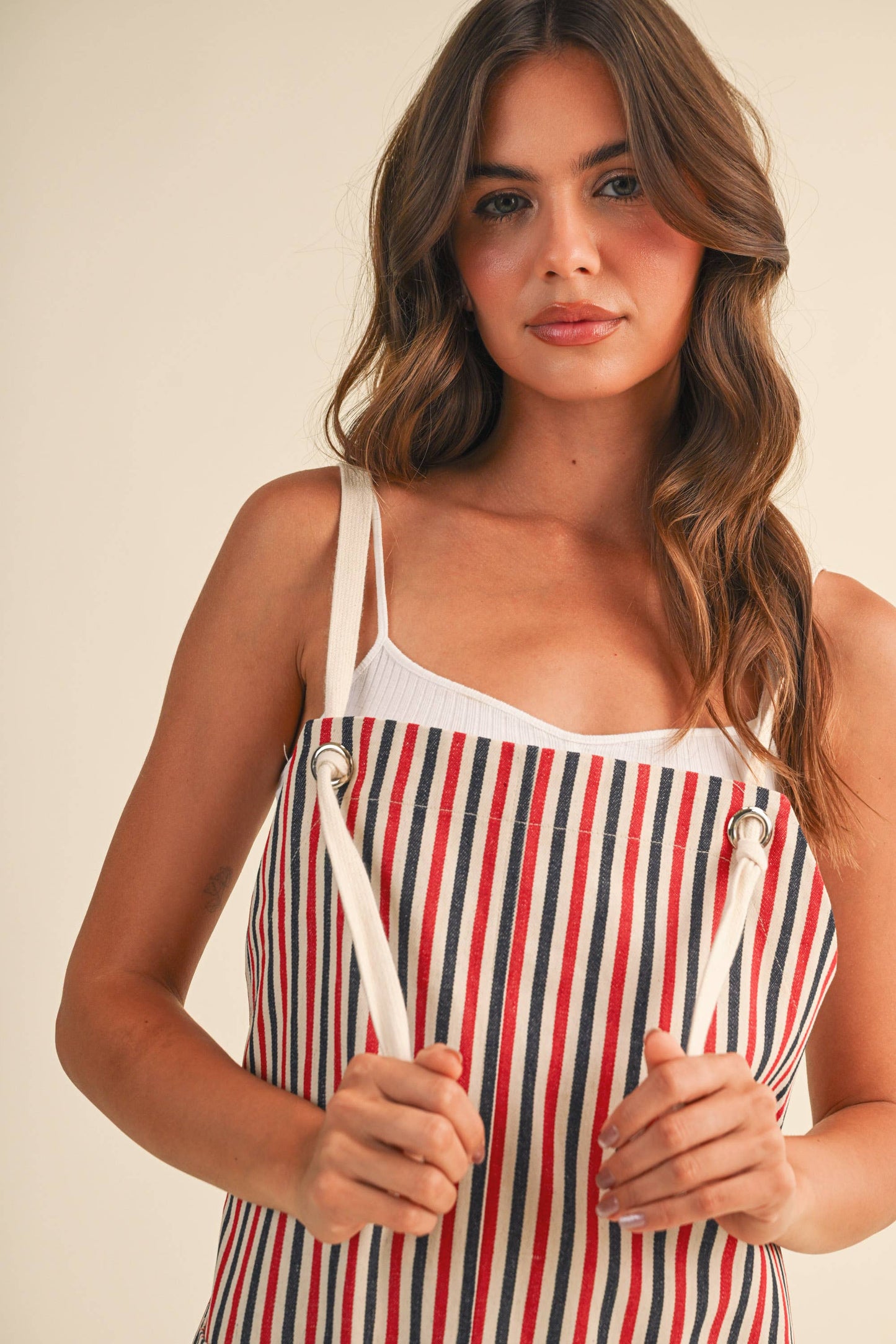 A MULTI STRIPED ROPE STRAP SHORTALLS: RED/BLUE