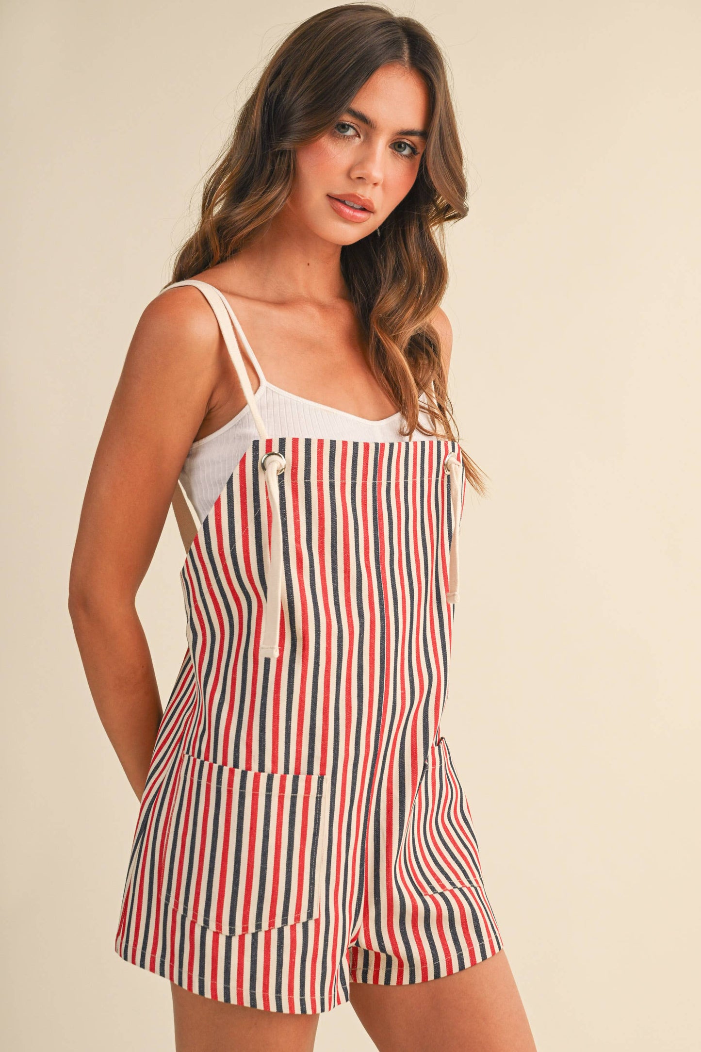 A MULTI STRIPED ROPE STRAP SHORTALLS: RED/BLUE
