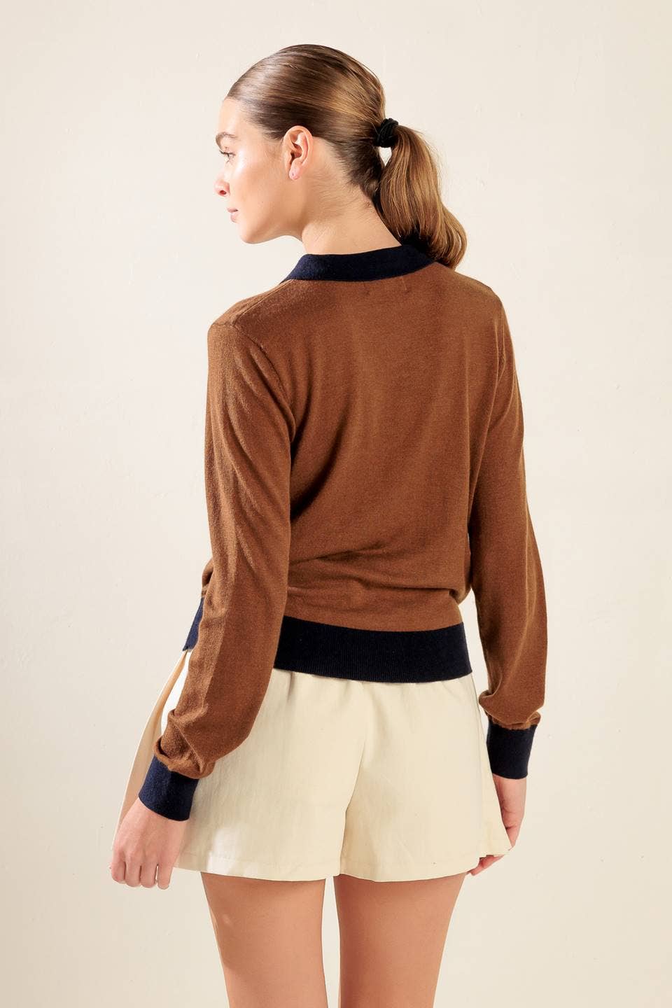 A solid sweater knit polo: BROWN NAVY